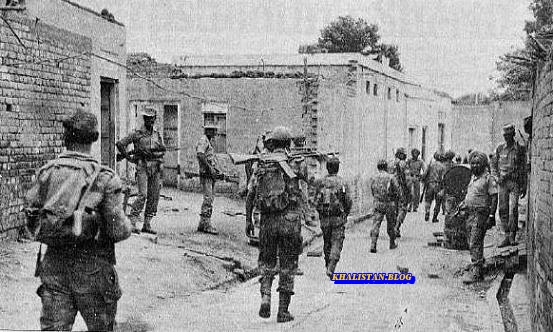 CRPF Platoon marching through a village