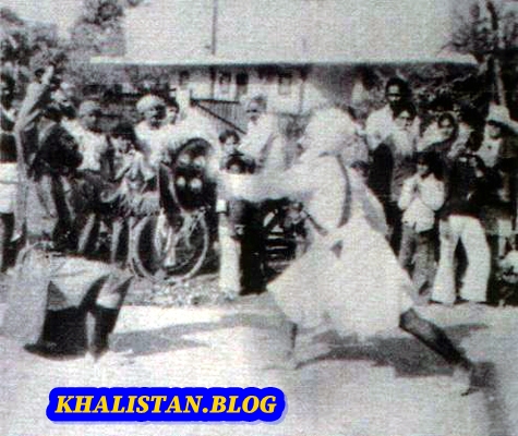 Shaheed Bhai Fauja Singh playing gatka